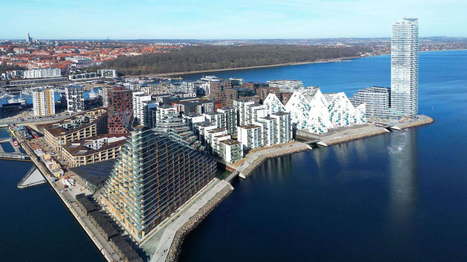 The modern Aarhus Ø waterfront, including the wave-shaped 'Iceberg' housing.