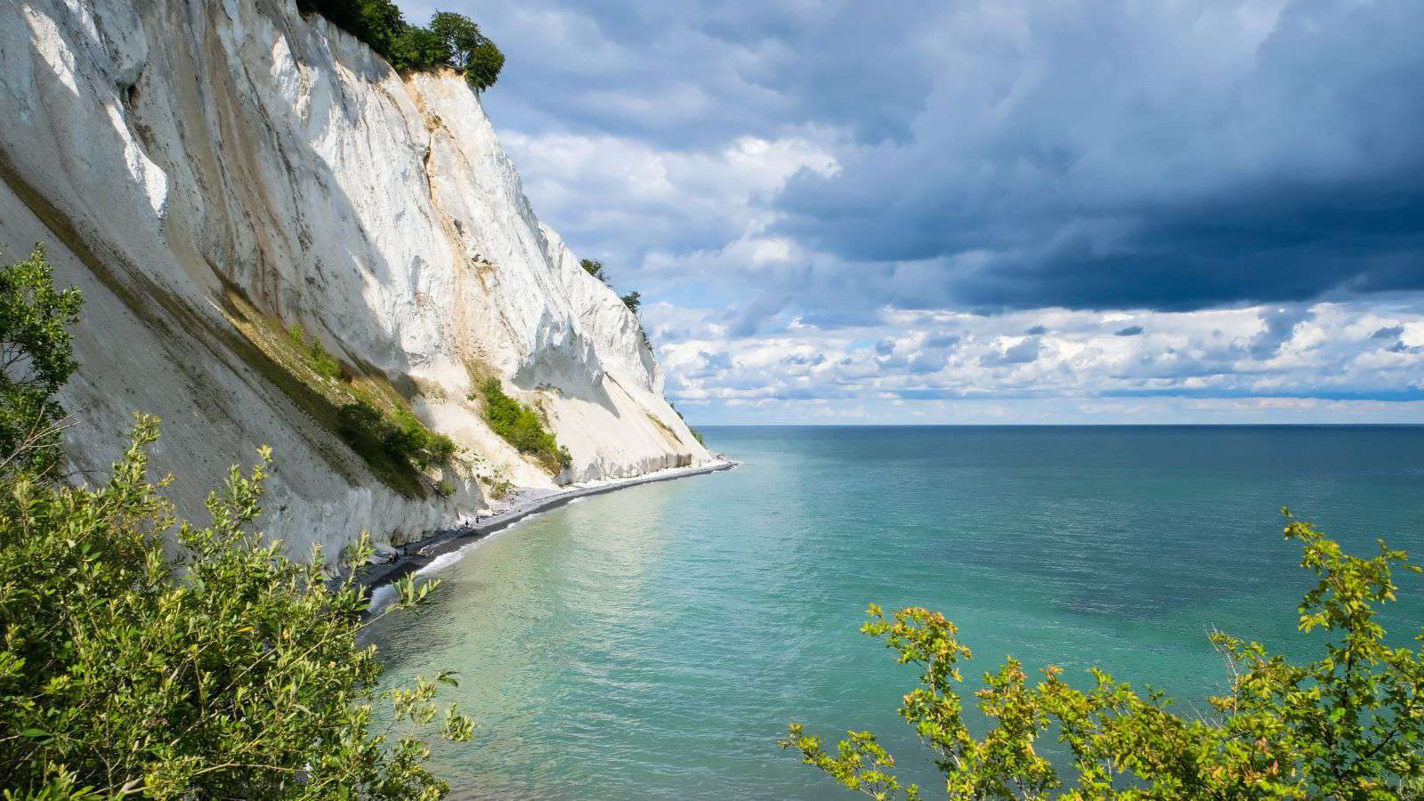 The white chalk cliffs of Møns Klint above the turquoise Baltic.