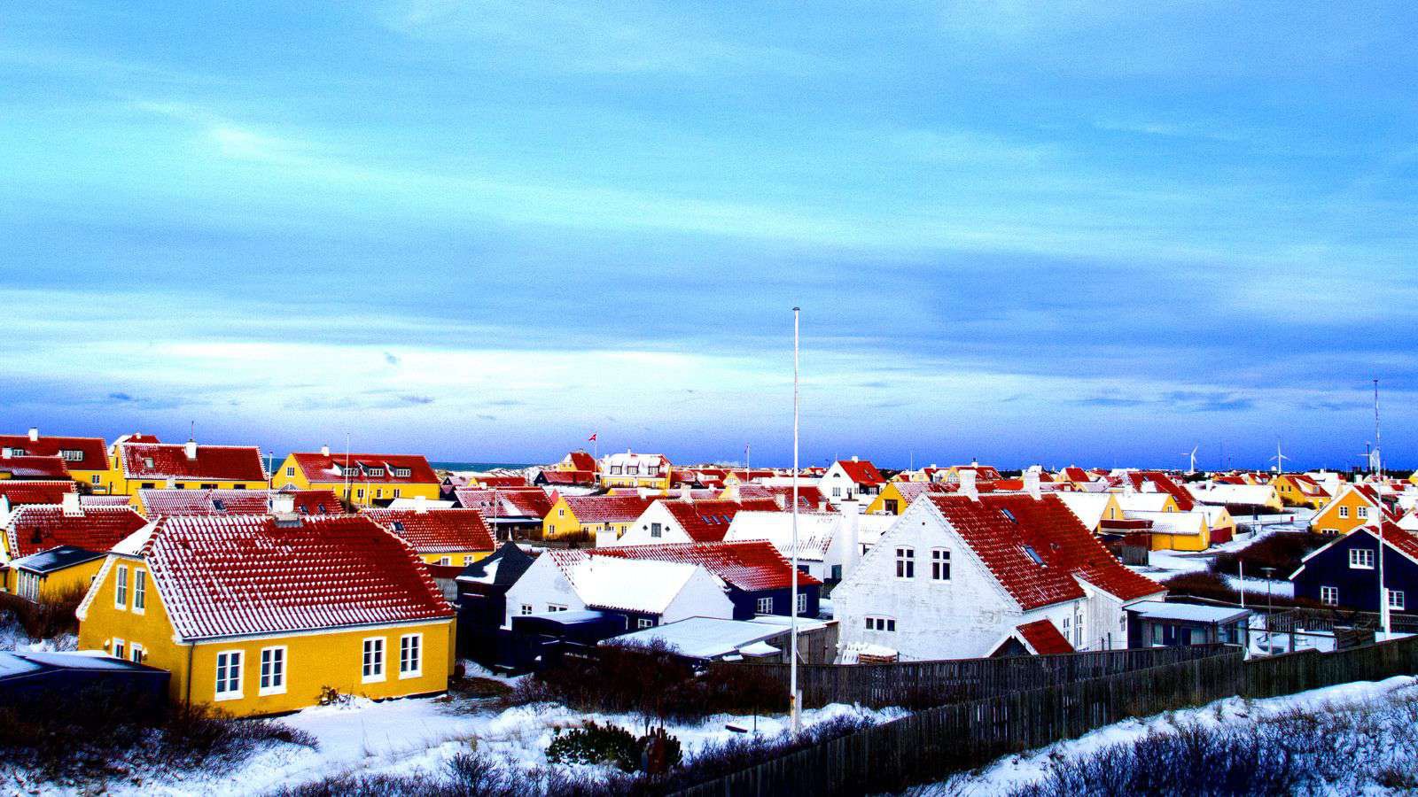 Skagen's trademark yellow houses with red-tiled roofs, near Denmark's northern tip.